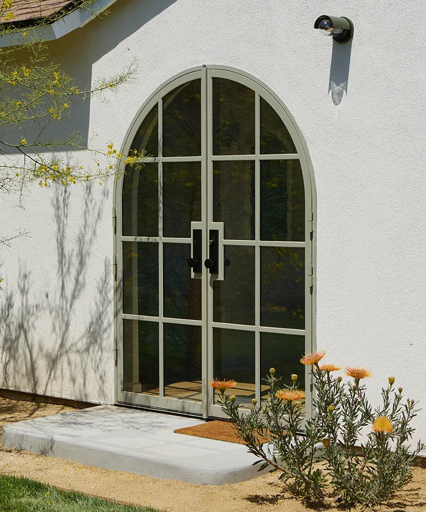 double full arch steel door in palm desert sand color
