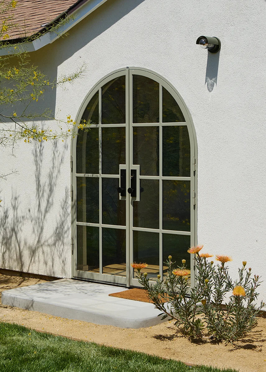 double full arch steel door in palm desert sand color