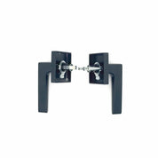 PINKYS passage lever in black with modern style and square escutcheon.