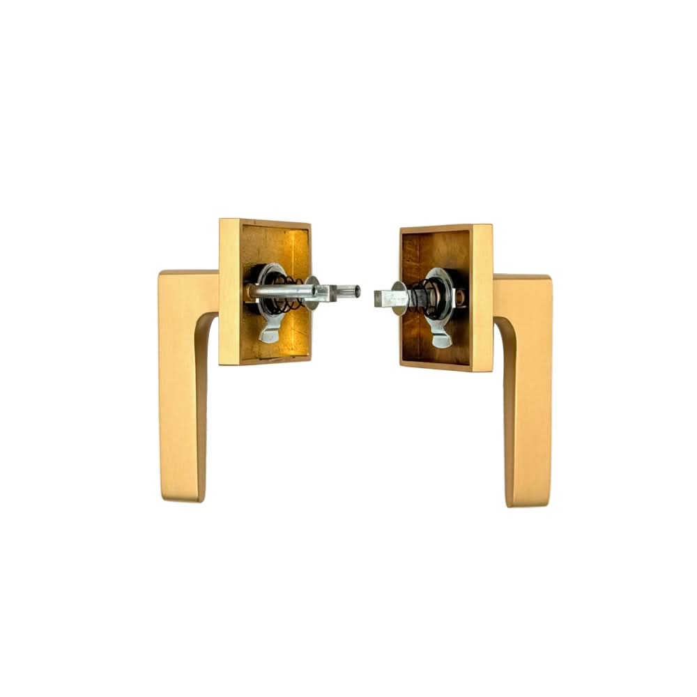 PINKYS passage lever with modern lever style for interior door in brass finish.