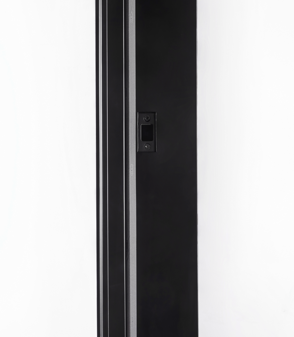 Closeup of steel pivot door strike plate