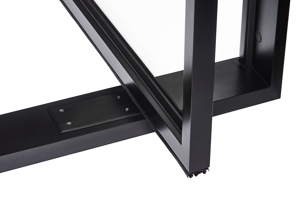 Closeup of steel pivot door threshold