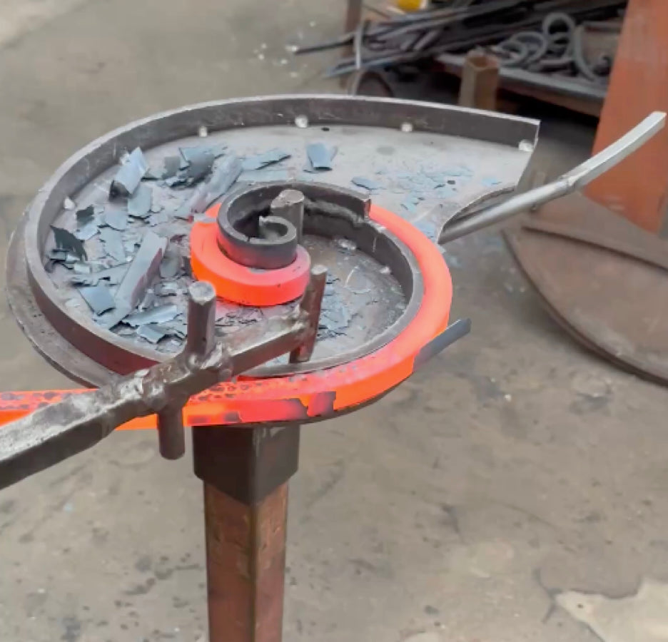 Photo of handcrafting iron scrollwork