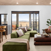 Air 4 black steel folding door system with expansive glass panels