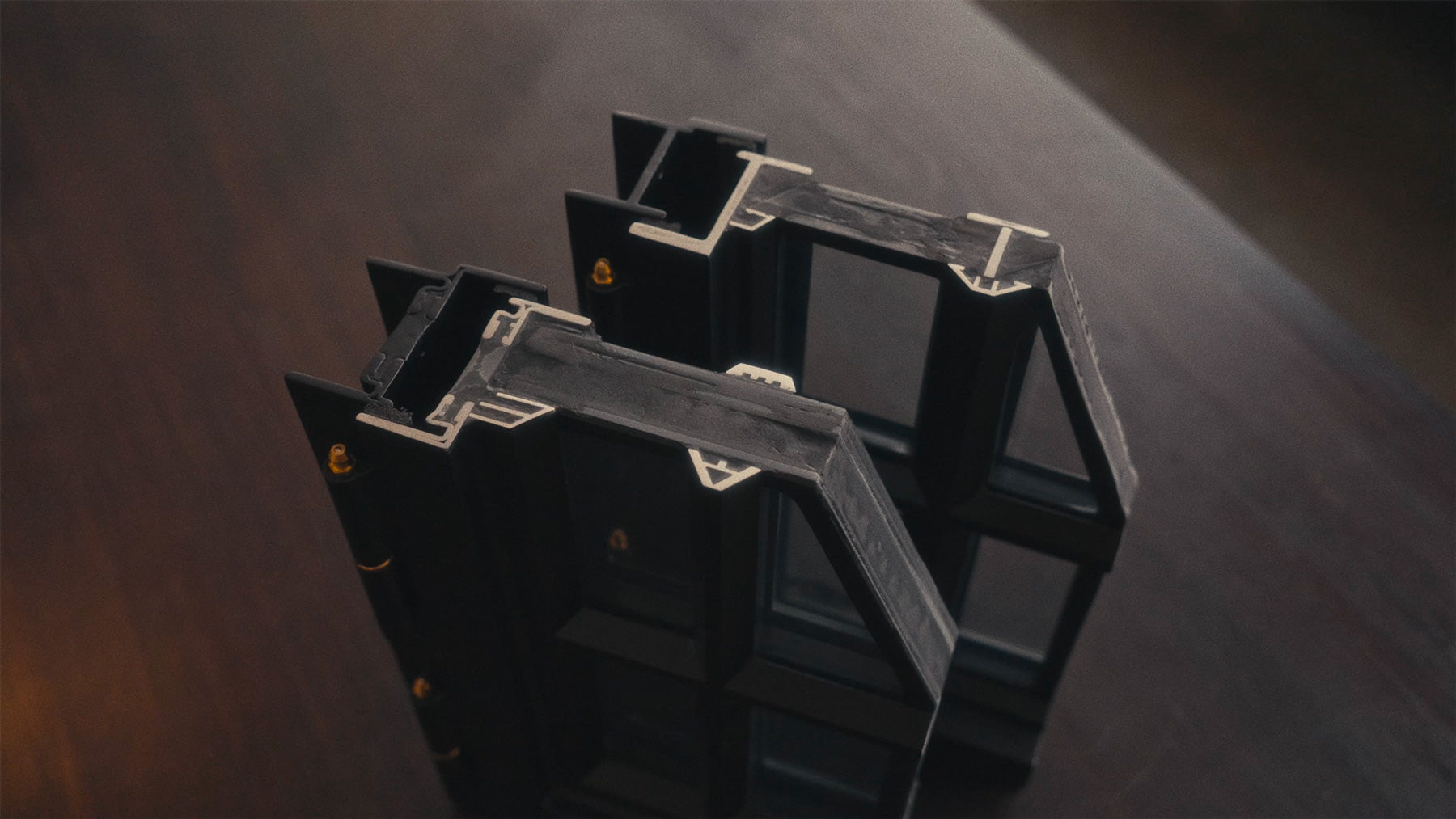closeup of two steel window corners showing the difference between SDL and TDL