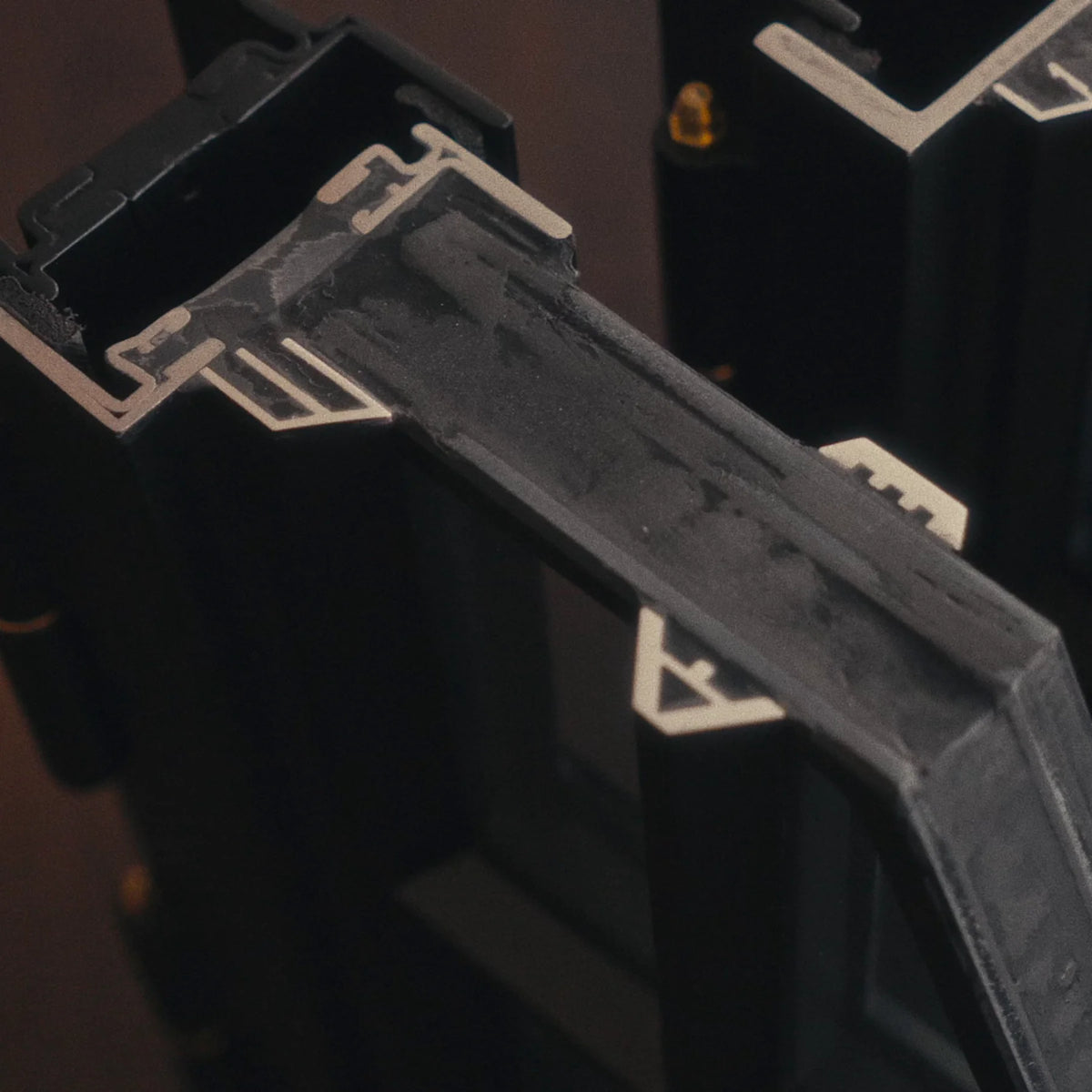 closeup of steel window corners showing simulated divided lite and thermal break