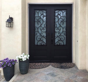 A pair of elegant wrought iron doors in an upscale entry way