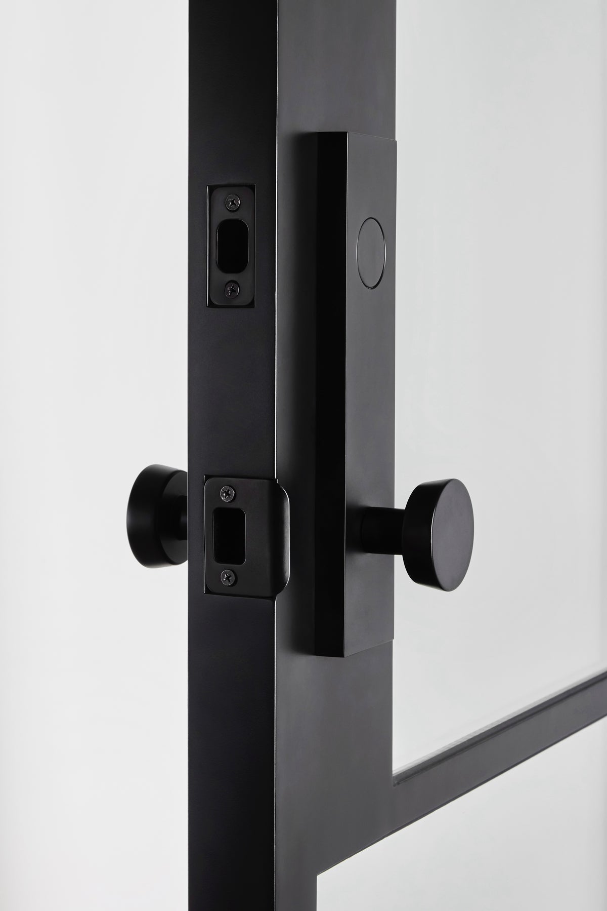 Closeup of steel door hardware showing thickness