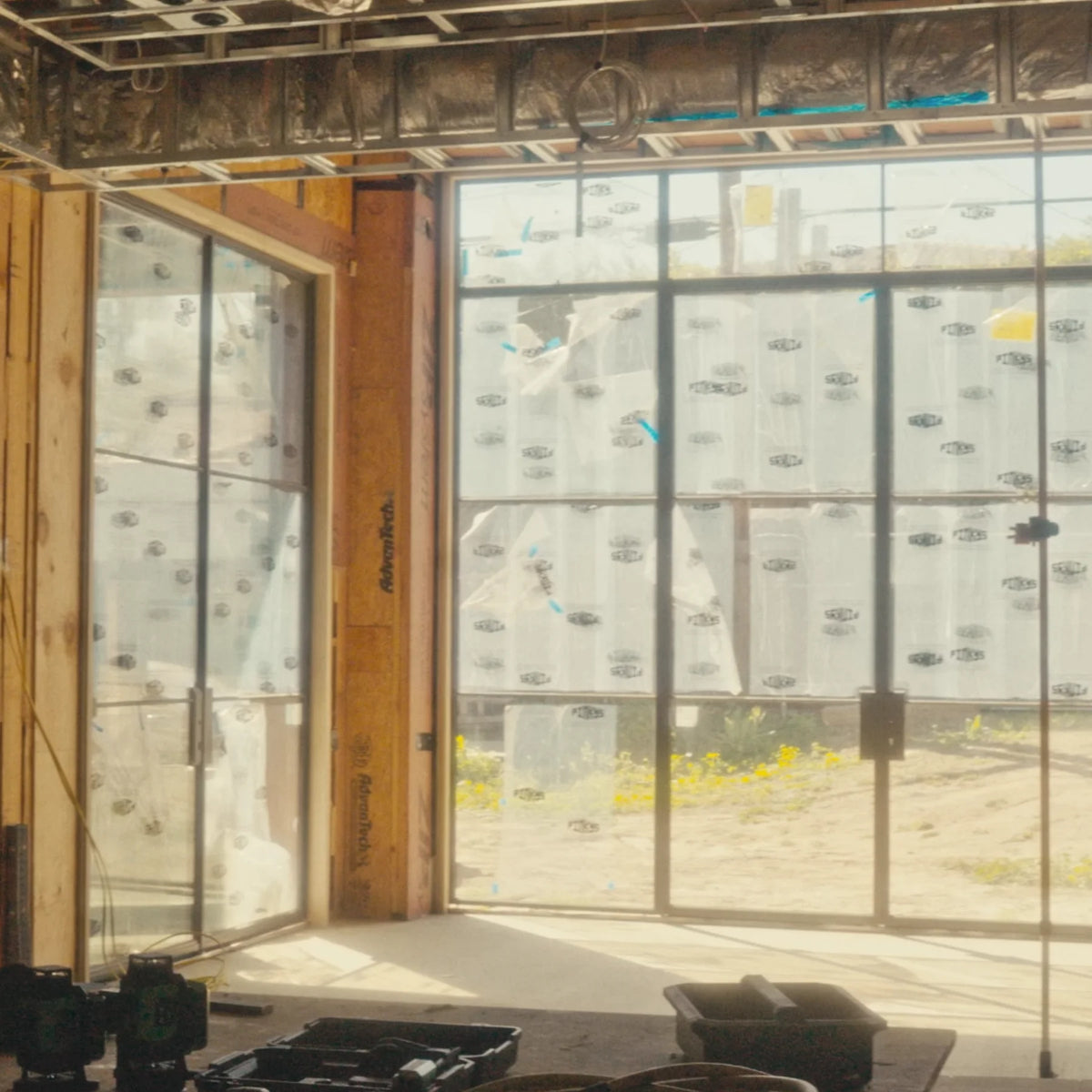 new construction featuring installation of large format steel doors with fixed panels