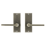 Bronze metro exterior door hardware in brushed silver living finish.