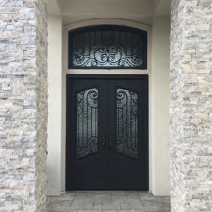 Double iron entry doors with a stylish top window in a home entry 