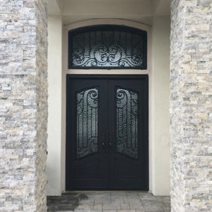 Double iron entry doors with a stylish top window in a home entry 