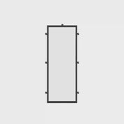 Custom steel side lite with slim architectural profile.