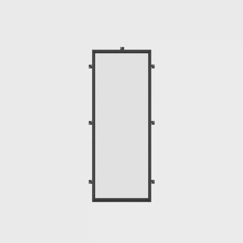 Custom steel side lite with slim architectural profile.