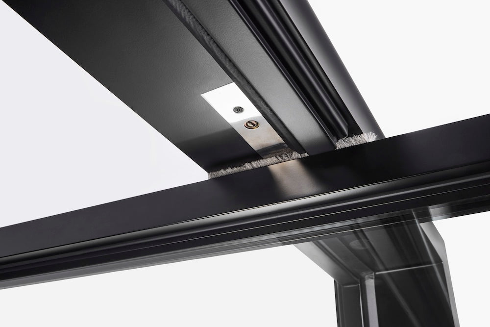 black contemporary pivot door with 90 degree swing and hydraulic pivot box