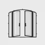 Exterior paired arch steel doors with sidelights.