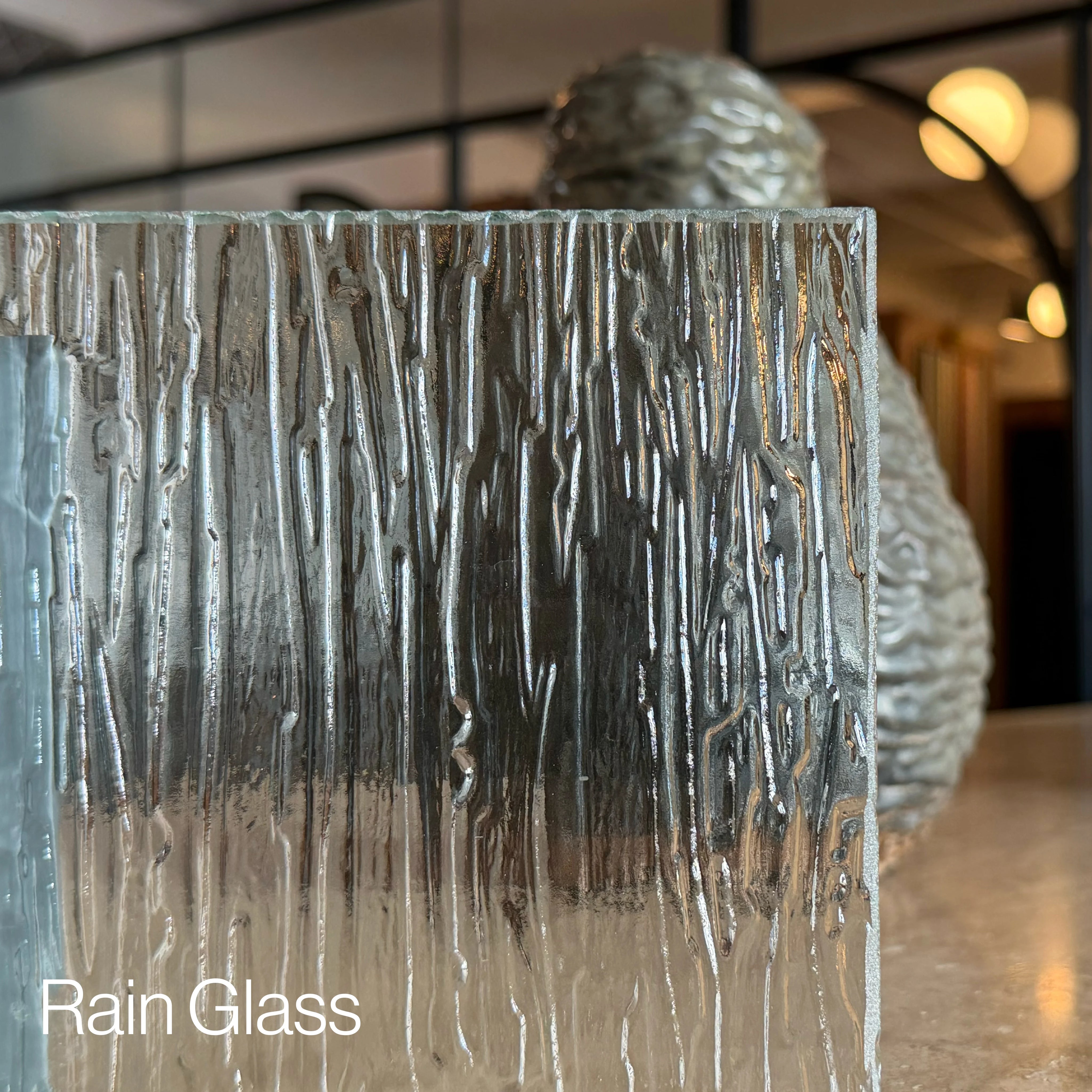 Rain glass sample with flowing water texture.