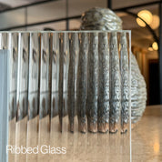 Vertical ribbed glass sample with distortion.