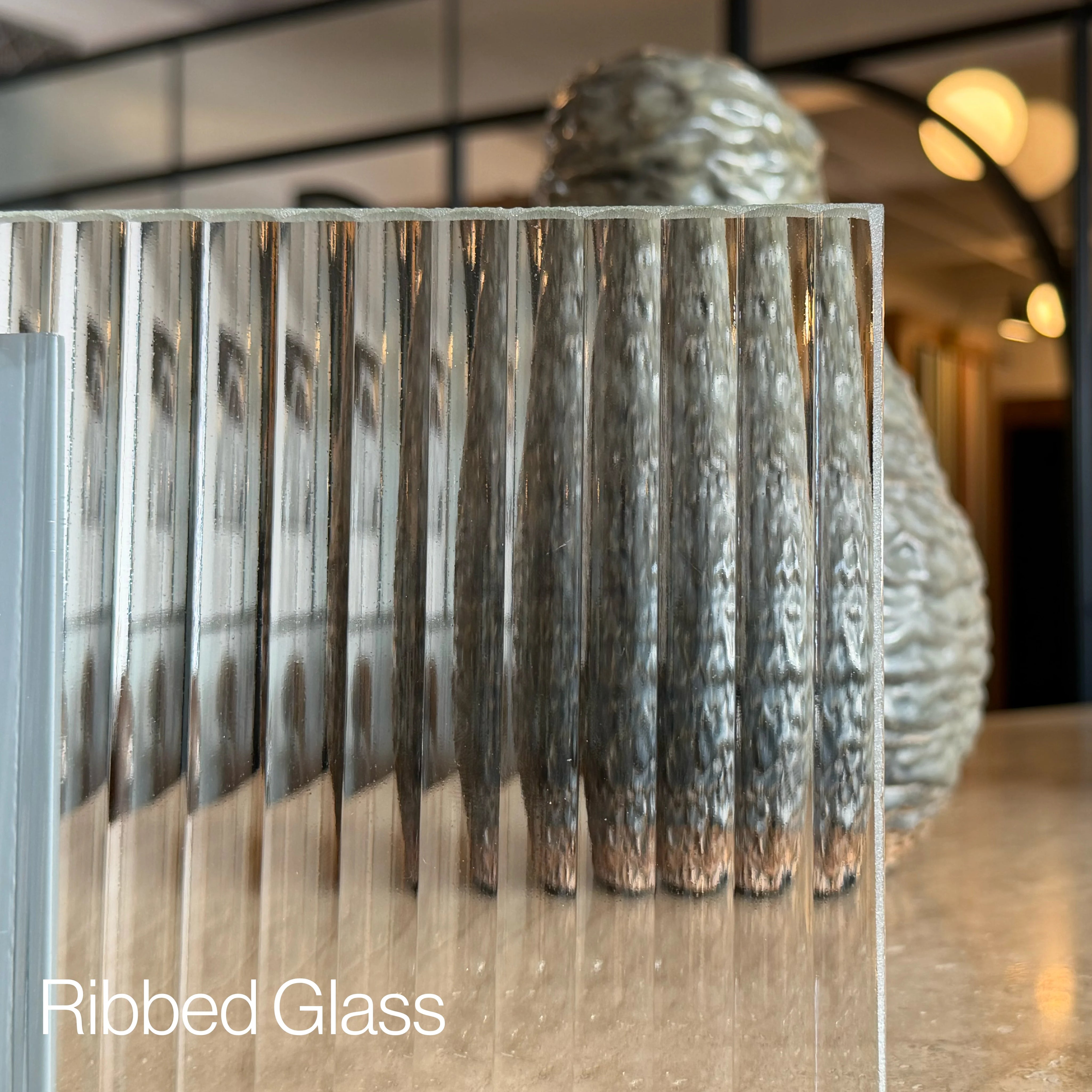 Vertical ribbed glass sample with distortion.