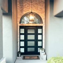 Load image into Gallery viewer, PINKYS Air 19 Exterior iron doors with side panel windows used as entry door.