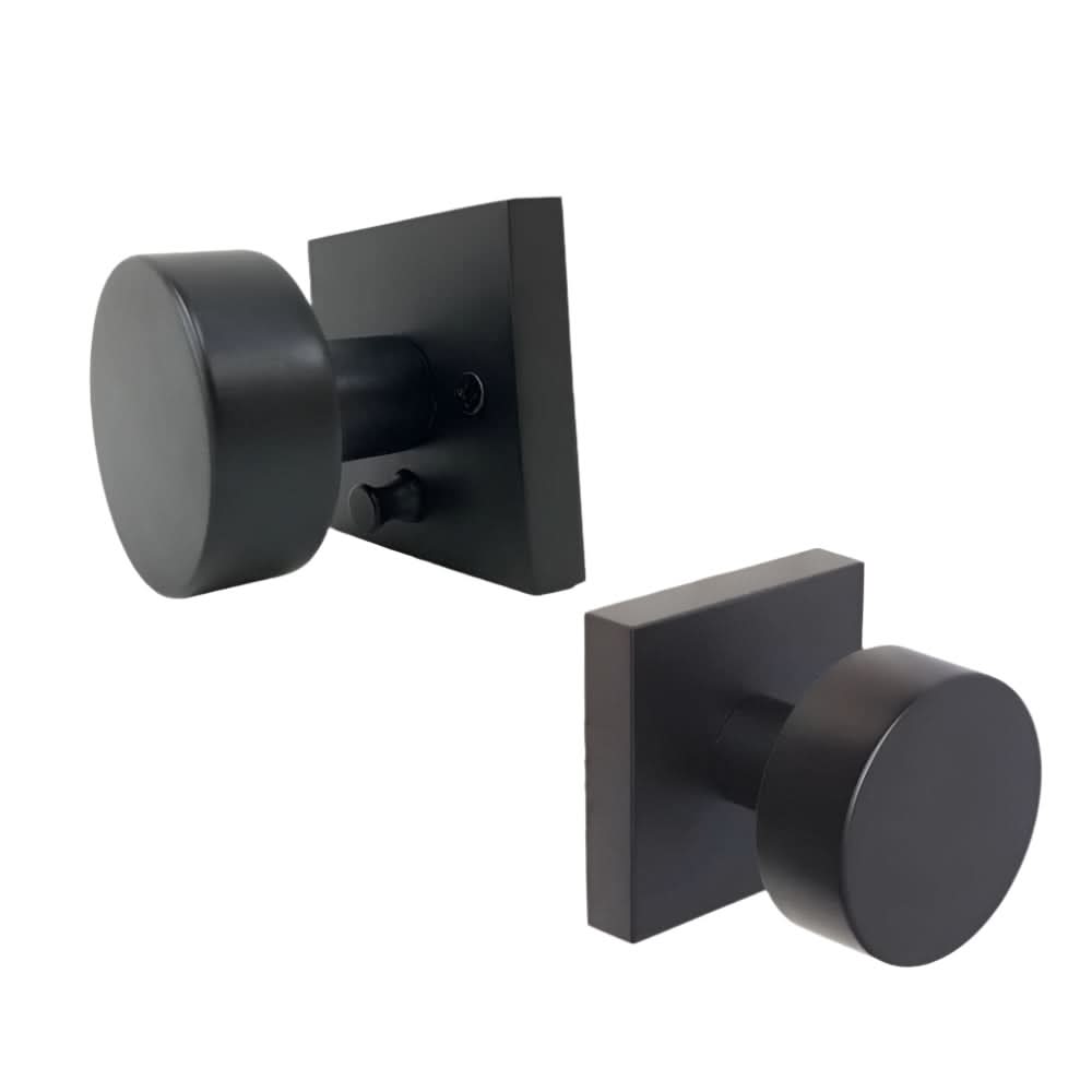 Black mesa privacy knob for interior door with locking pin.