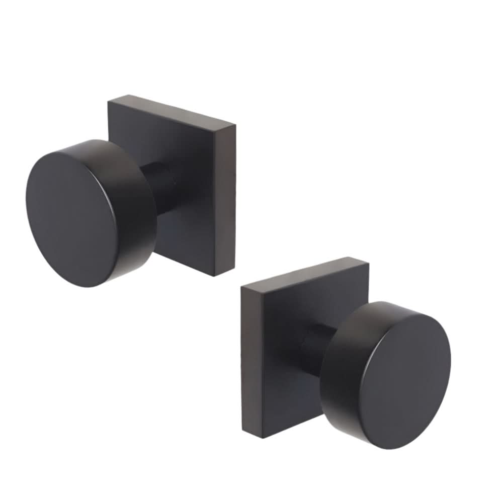 Modern mesa passage knob in black finish for interior door.