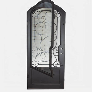 Single entryway door with a thick steel and iron frame, a large window behind an intricate iron pattern, a slight arch on top, and a solid bottom panel. Door is thermally broken to protect from extreme weather.