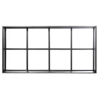 Transom 8-pane window made from thin iron framing. Window is thermally broken to protect from extreme weather.