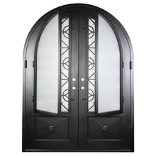 Load image into Gallery viewer, Double doors with a thick steel frame and windows behind intricate detailing from PINKYS