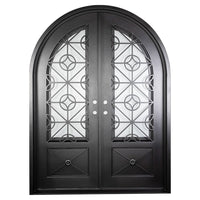 Double doors with a thick steel frame and windows behind intricate detailing from PINKYS