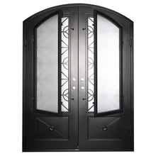 Load image into Gallery viewer, Double doors with a thick steel frame and windows behind intricate detailing from PINKYS