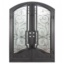 Load image into Gallery viewer, Double entryway doors with a thick steel and iron frame, two large windows behind an intricate iron pattern, a curved kickplate, and a slight arch on top. Doors are thermally broken to protect from extreme weather.