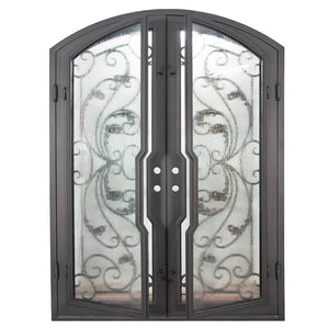 Double doors for an entryway made with a thick iron and steel frame, a slight arch at the top, and full paneled windows behind an intricate iron design. Doors are thermally broken to protect from extreme weather.