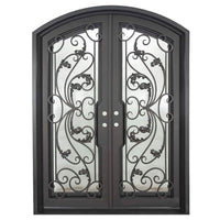 Double doors for an entryway made with a thick iron and steel frame, a slight arch at the top, and full paneled windows behind an intricate iron design. Doors are thermally broken to protect from extreme weather.