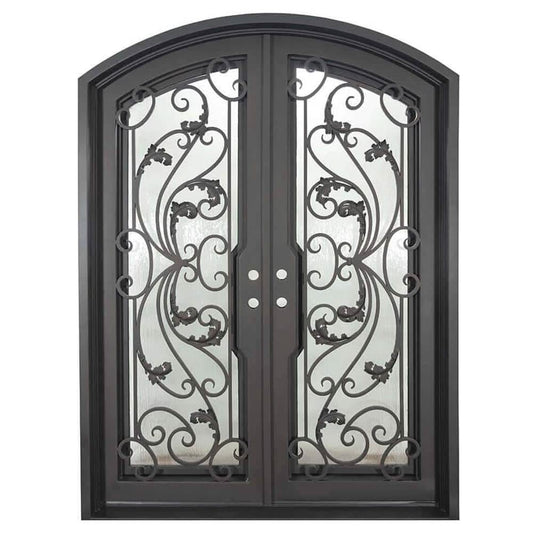Double doors for an entryway made with a thick iron and steel frame, a slight arch at the top, and full paneled windows behind an intricate iron design. Doors are thermally broken to protect from extreme weather.
