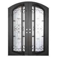 Double entryway doors made with a thick iron frame and a slight arch. Doors feature a full panel of glass behind iron detailing and are thermally broken to protect from extreme weather.