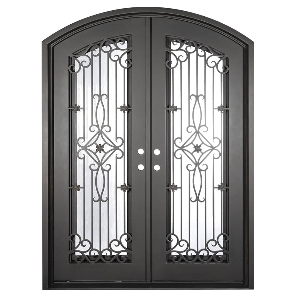 Double entryway doors made with a thick iron frame and a slight arch. Doors feature a full panel of glass behind iron detailing and are thermally broken to protect from extreme weather.