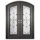Double entryway doors made with a thick iron frame and a slight arch. Doors feature a full panel of glass behind iron detailing and are thermally broken to protect from extreme weather.