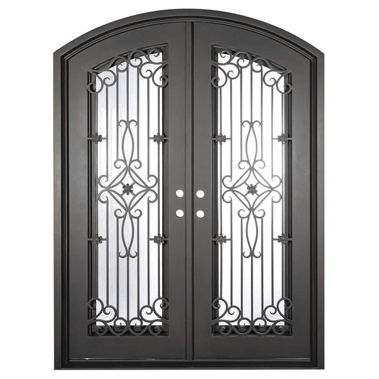 Double entryway doors with a thick iron frame, a slight arch and a full panel of glass behind an intricate iron design.