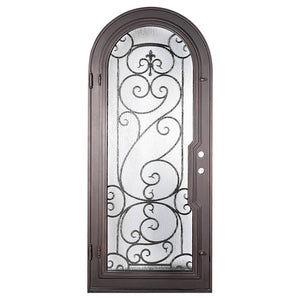 Single entryway door with a thick iron frame and a panel of glass behind an intricate iron design.