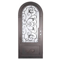 Single entryway door made with a thick iron and steel frame and a single paned window behind an intricate iron design. Door is thermally broken to protect from extreme weather.
