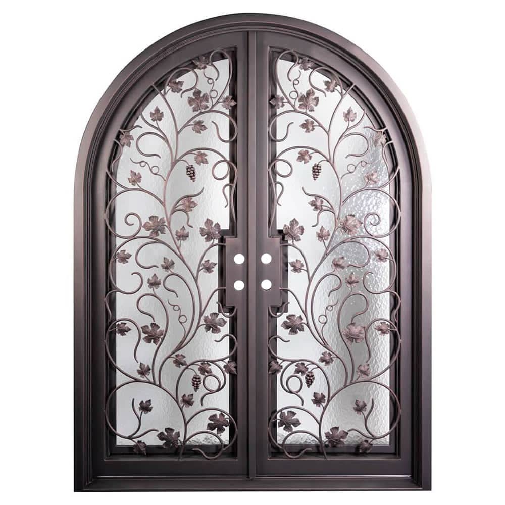 Double entryway doors made with a thick iron and steel frame, a single full pane of glass behind an intricate iron design on each door.