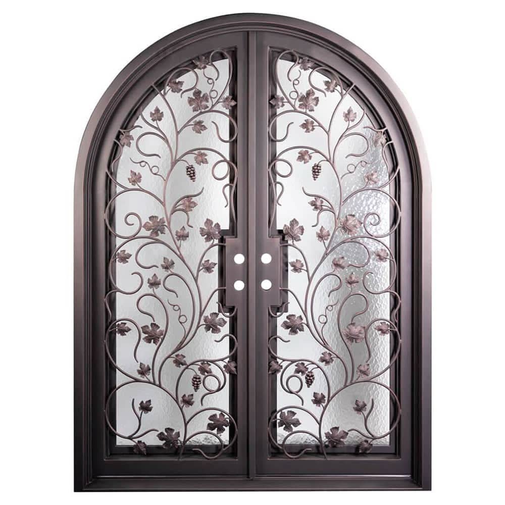 Double entryway doors featuring a full pane of glass behind an intricate iron pattern on each door and a full arch on top. Doors are thermally broken to protect from extreme weather.