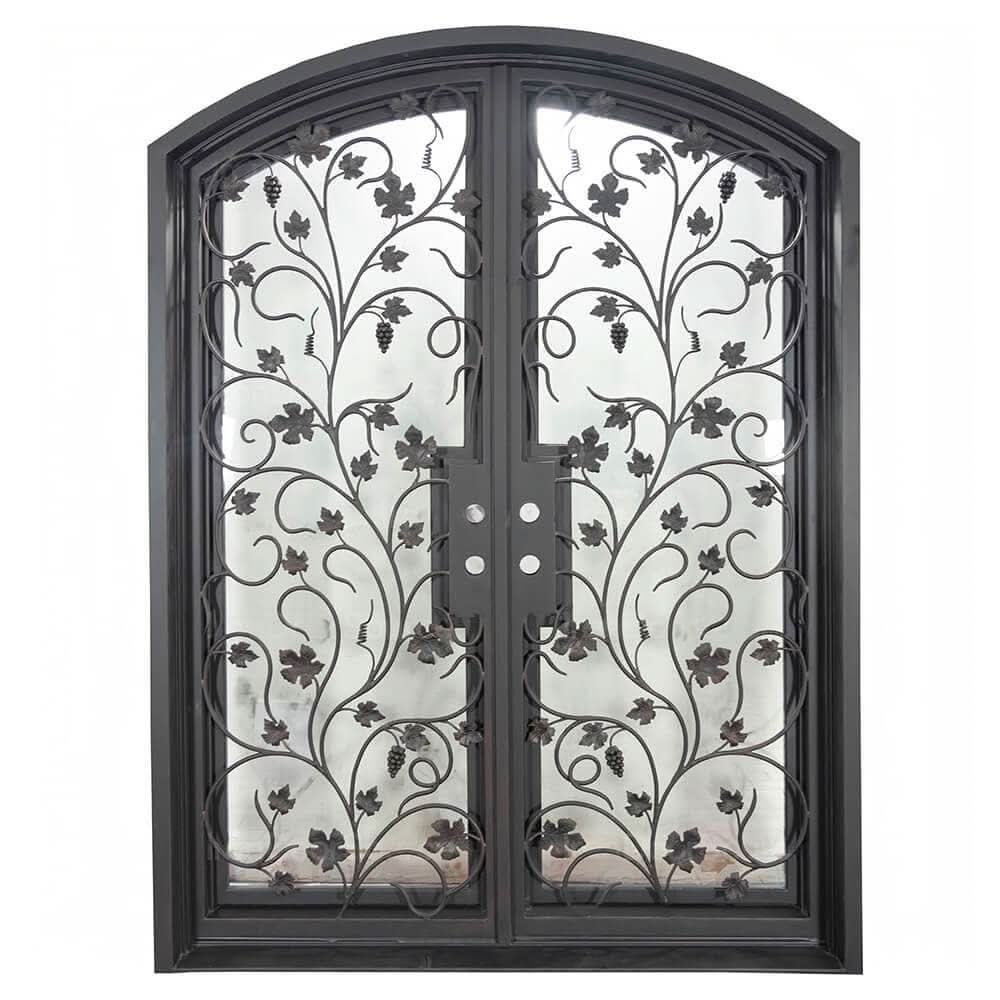 June bronze colored iron entry door with arched top.