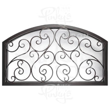 Load image into Gallery viewer, Large slightly arched transom window behind an intricate iron pattern. Window is thermally broken to protect from extreme weather.