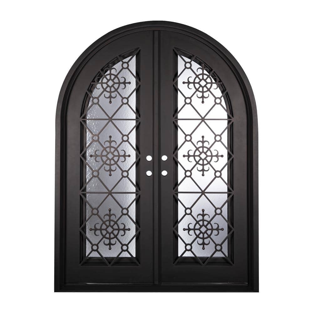 Double entryway doors with full panes of glass behind intricate iron detailing. Doors feature a full arch and are thermally broken to protect from extreme weather.