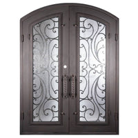 Double entryway doors made with a thick iron and steel frame. Doors feature full panel windows behind intricate iron detailing, a kickplate, and a slight arch on top. Doors are thermally broken to protect from extreme weather.