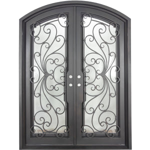 Double entryway doors with a thick iron and steel frame and a full pane of glass behind intricate iron detailing.