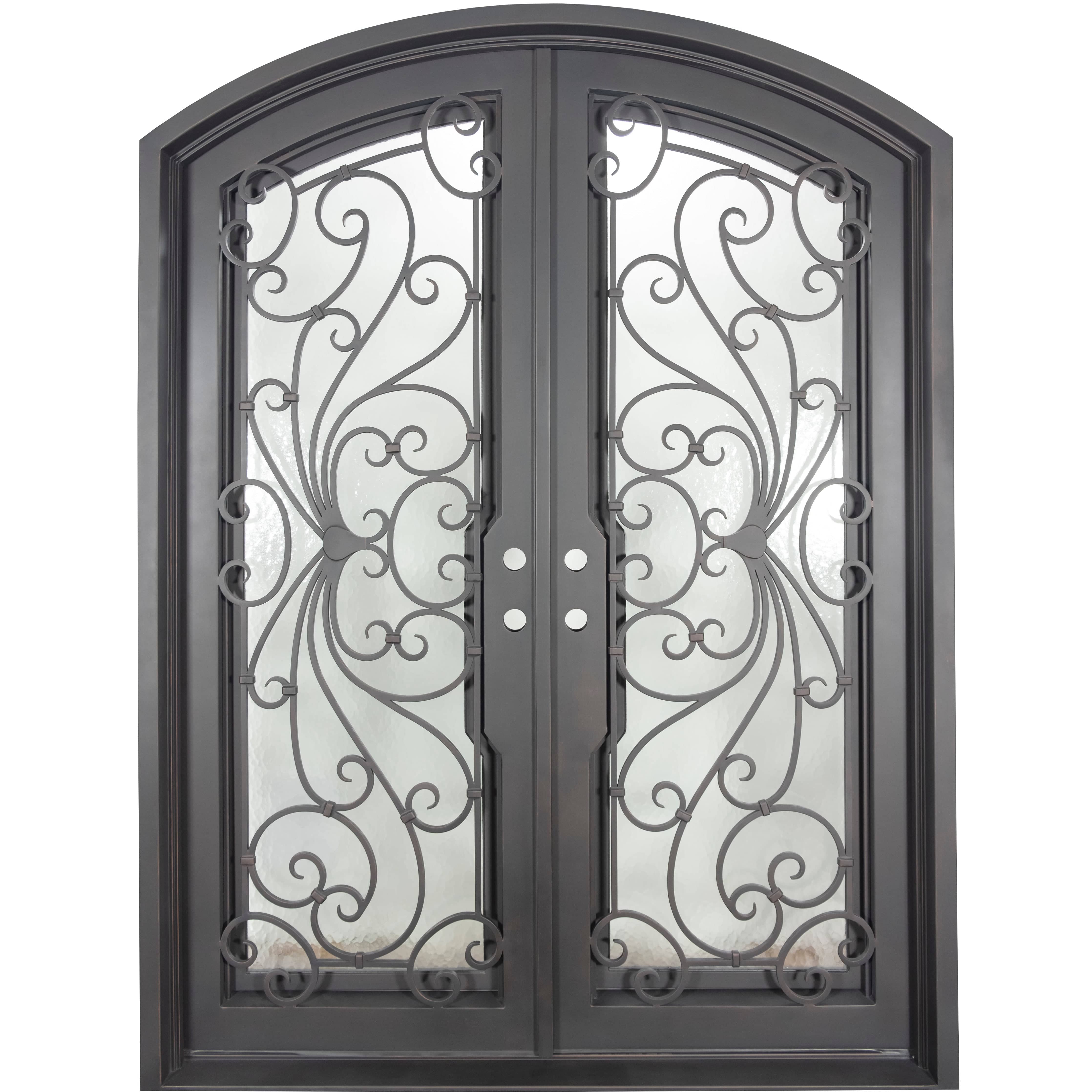 Double entryway doors with a thick iron and steel frame and a full pane of glass on each door behind intricate iron detailing. Doors are thermally broken to protect from extreme weather. 