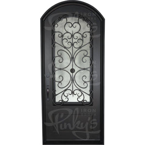 Single entryway door with a thick iron frame and intricate iron detailing behind a 3/4 pane of glass. Door features a slight arch and is thermally broken to protect from extreme weather.